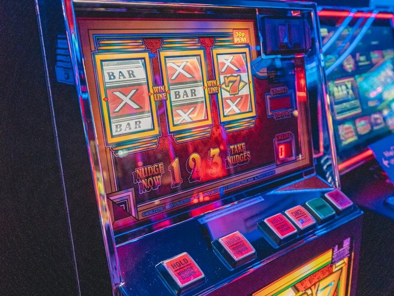 slot machine with lights turned on in the dark